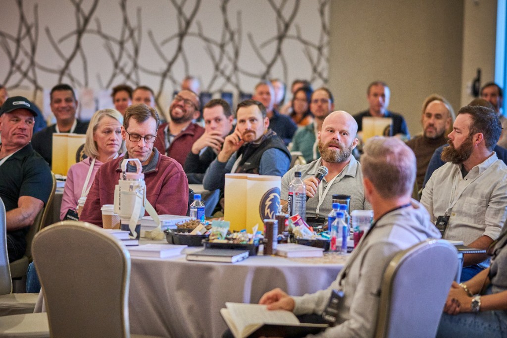 Members around a table during the retreat